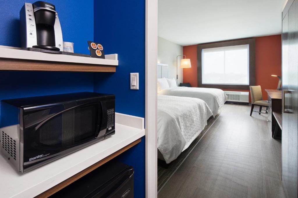 Postel nebo postele na pokoji v ubytování Holiday Inn Express & Suites Lubbock Central - Univ Area by IHG