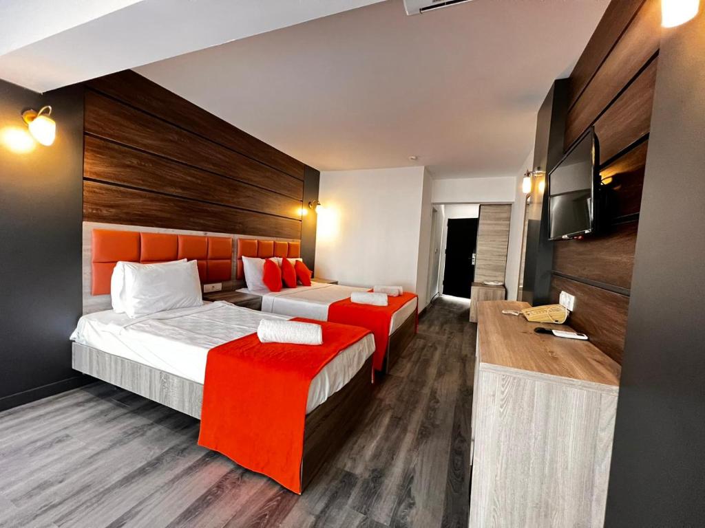 Postel nebo postele na pokoji v ubytování Maya World Didyma Hotel
