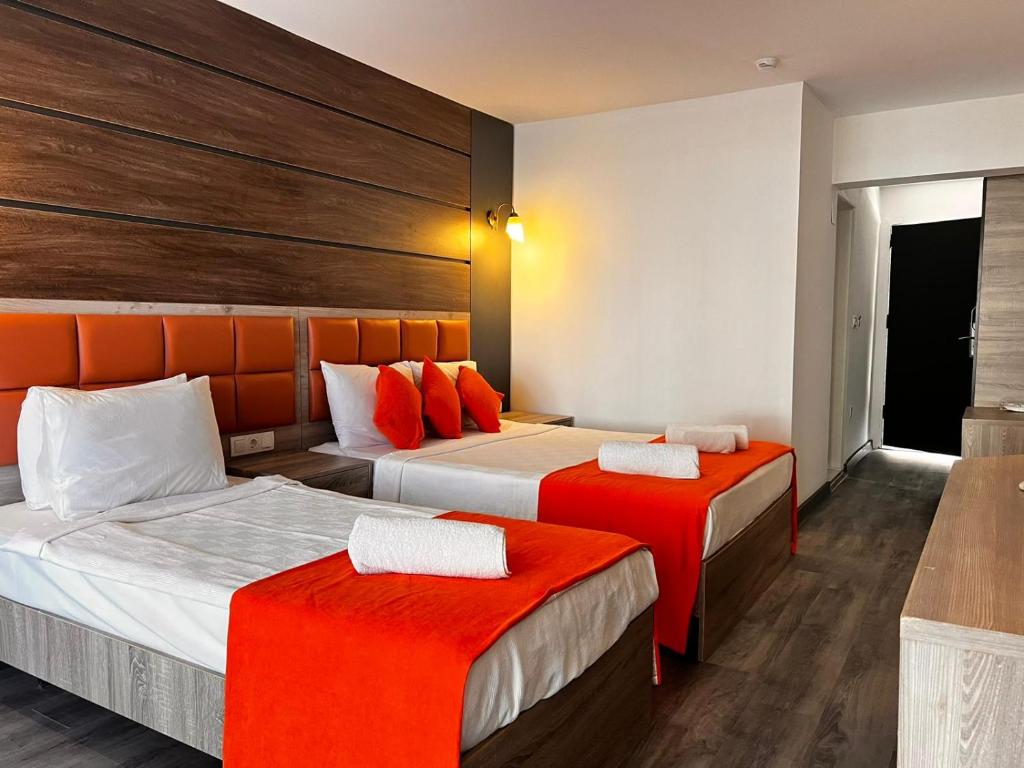 Postel nebo postele na pokoji v ubytování Maya World Didyma Hotel