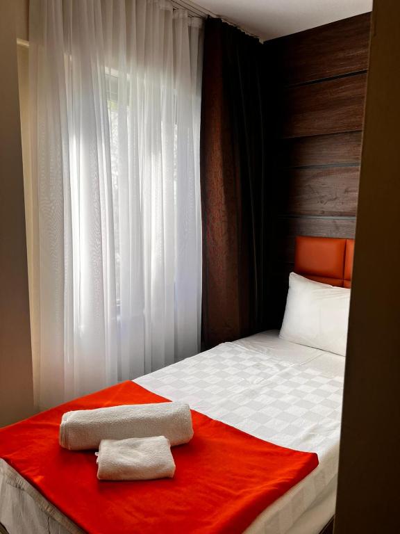 Postel nebo postele na pokoji v ubytování Maya World Didyma Hotel