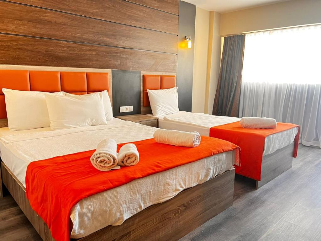 Postel nebo postele na pokoji v ubytování Maya World Didyma Hotel
