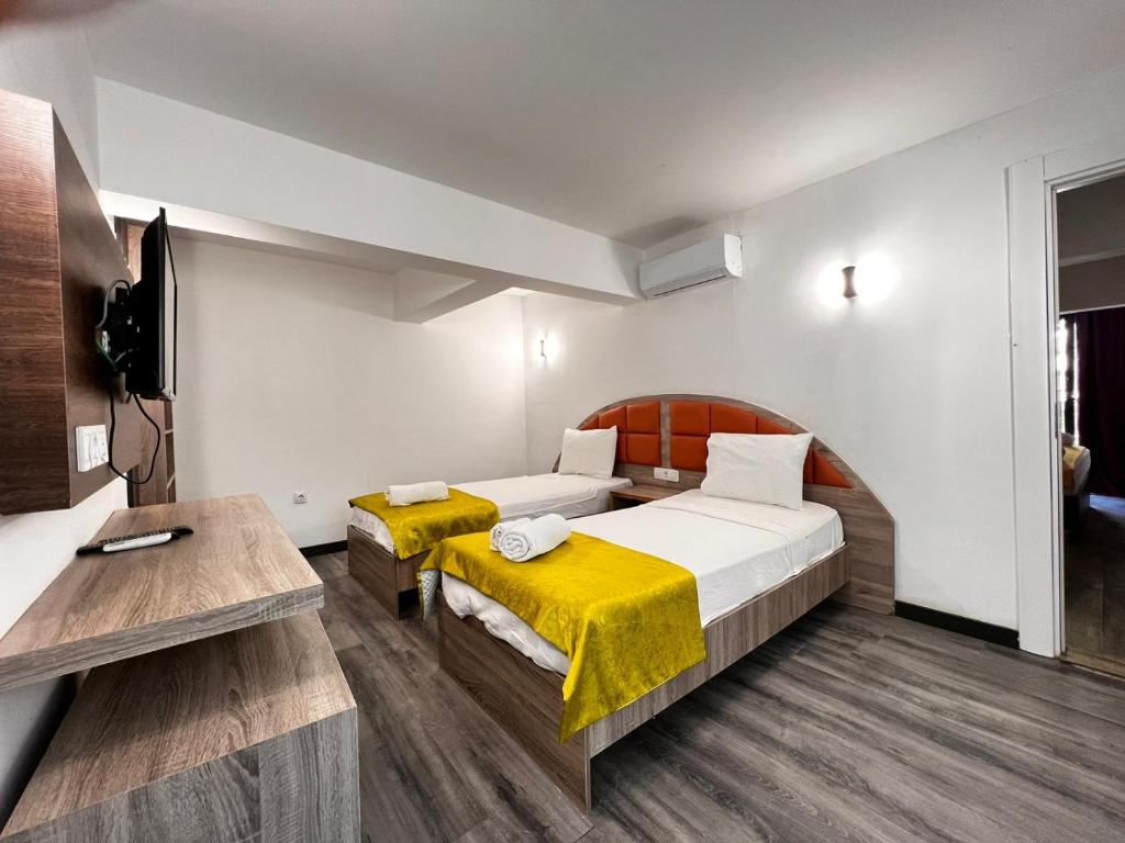 Postel nebo postele na pokoji v ubytování Maya World Didyma Hotel