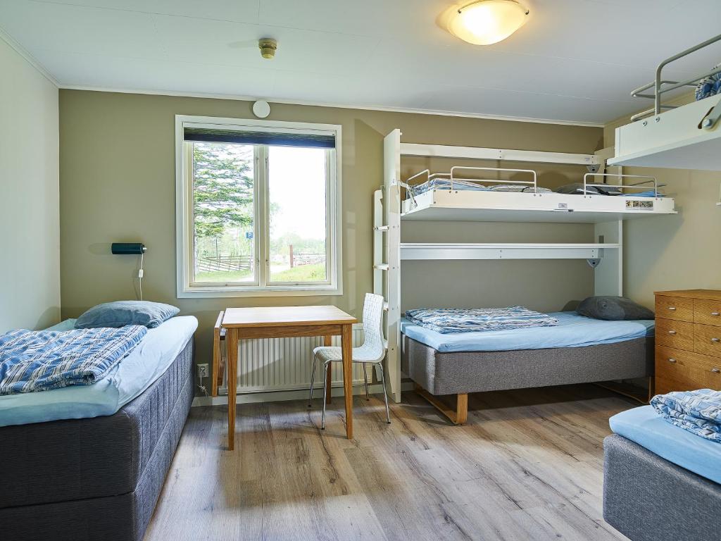 Postel nebo postele na pokoji v ubytování Sudersand Resort