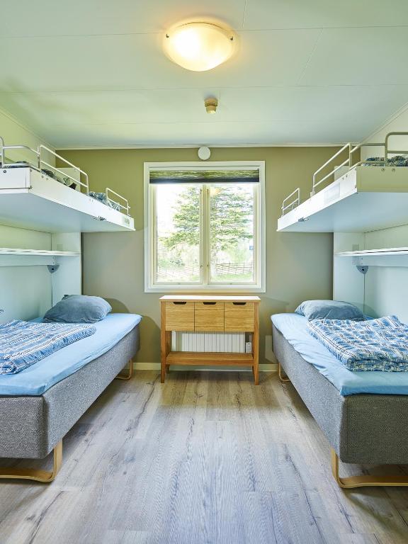 Postel nebo postele na pokoji v ubytování Sudersand Resort