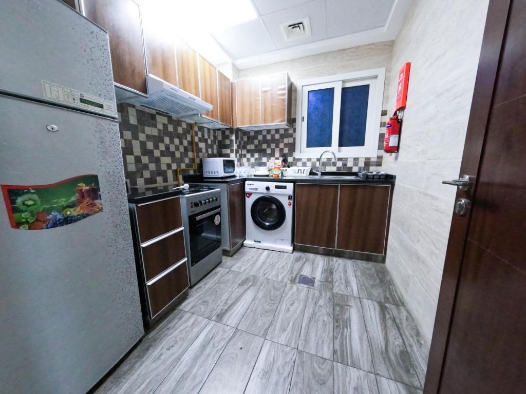 Cucina o angolo cottura di Barsha Star Residence - Home Stay