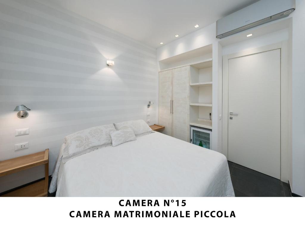 Posteľ alebo postele v izbe v ubytovaní I Tibei Guesthouse Affittacamere