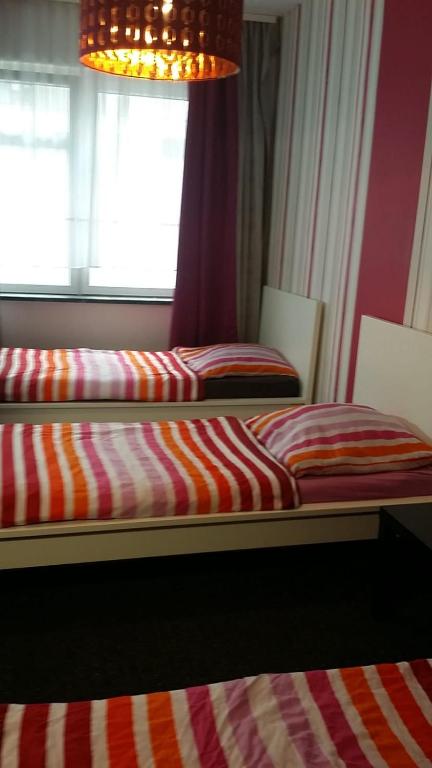 Postel nebo postele na pokoji v ubytování Paulibude
