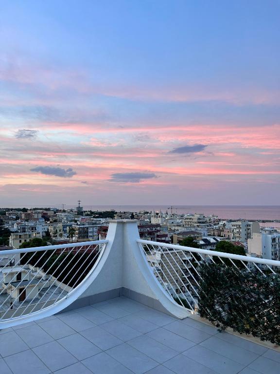 a balcony with a view of a city at ISOLA ROVI in Santo Spirito