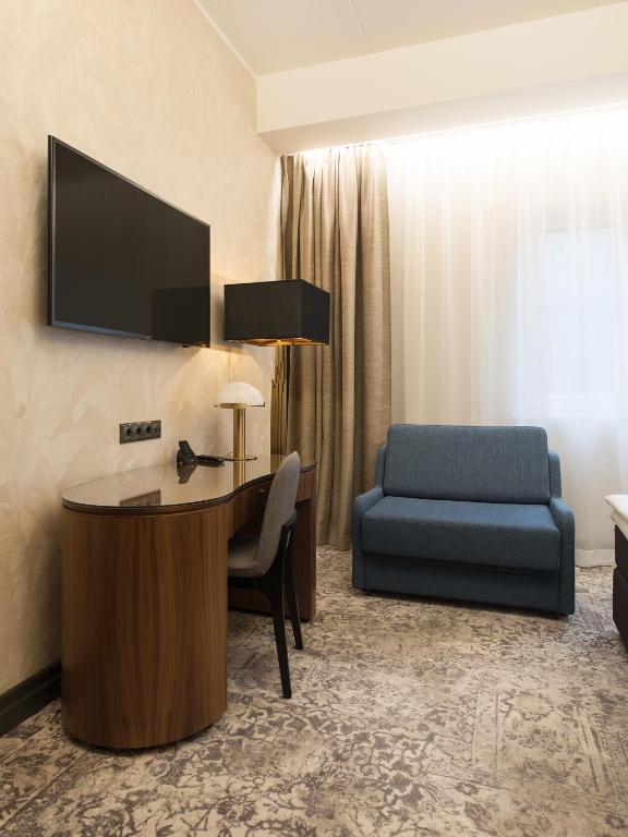 Televiisor ja/või meelelahutuskeskus majutusasutuses V Spa & Conference Hotel