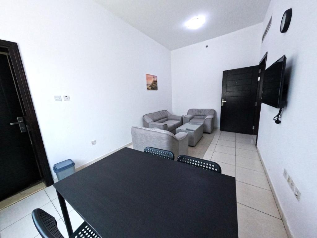 TV a/nebo společenská místnost v ubytování Al Badaa Star Residence - Home Stay