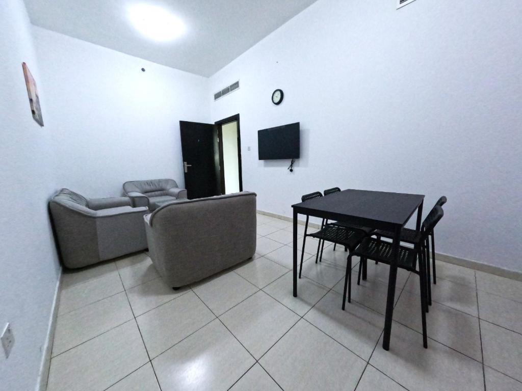 TV a/nebo společenská místnost v ubytování Al Badaa Star Residence - Home Stay