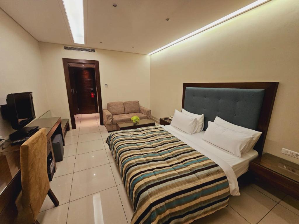 TV a/nebo společenská místnost v ubytování Verdun Suites Hotel