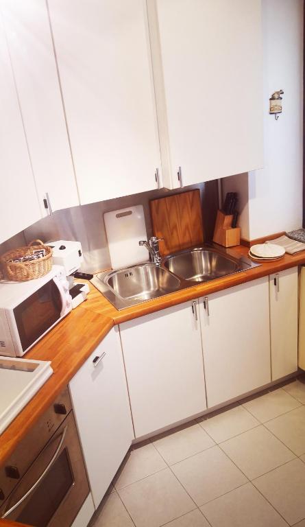 Kuchyň nebo kuchyňský kout v ubytování Residenza Esse