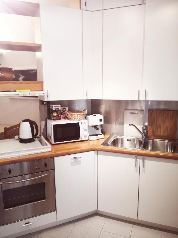 Kuchyň nebo kuchyňský kout v ubytování Residenza Esse