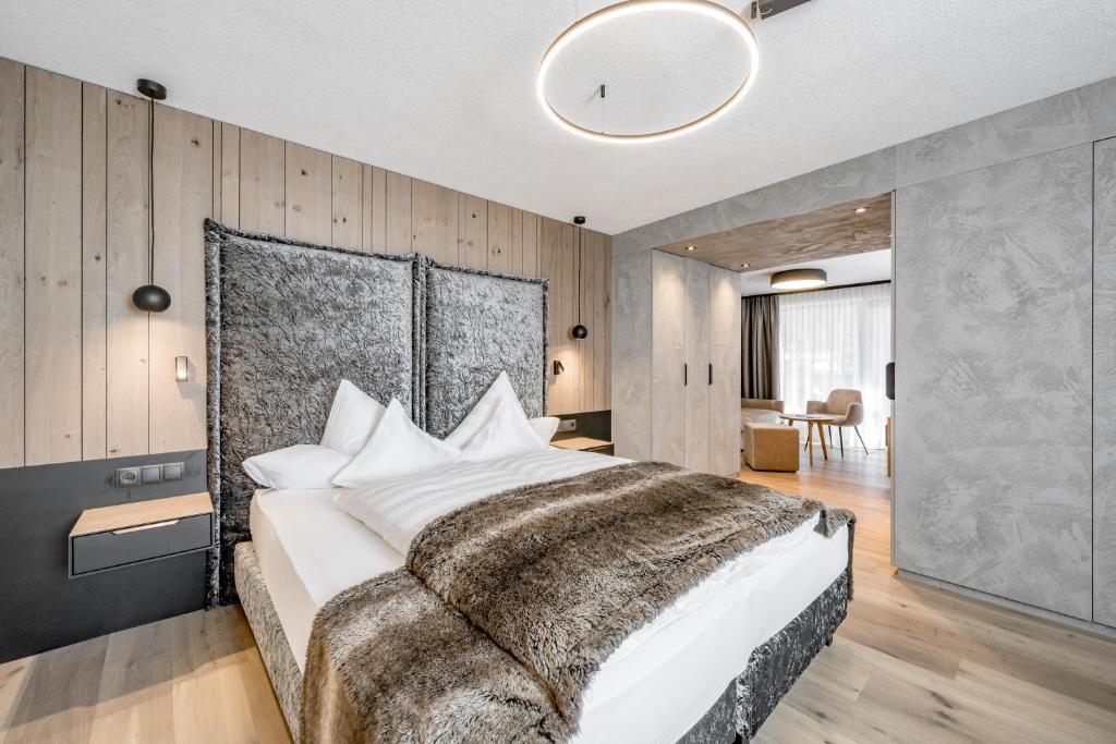 Postel nebo postele na pokoji v ubytování Hotel Grauer Bär