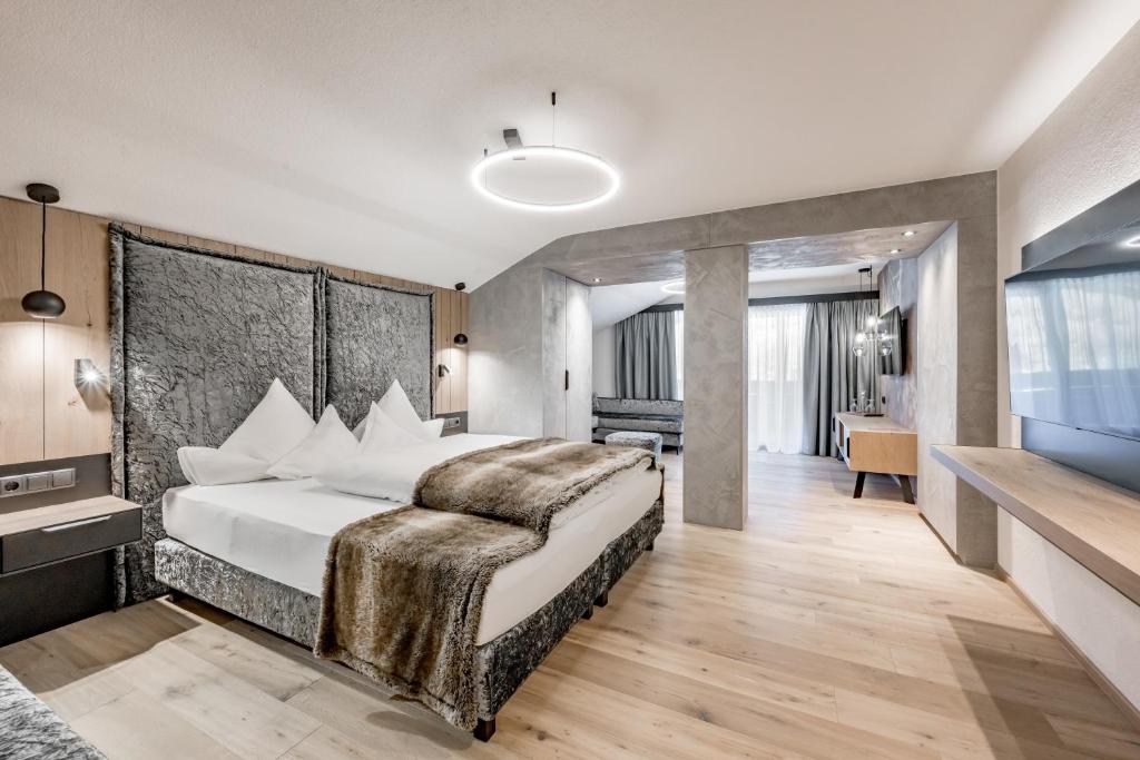 Postel nebo postele na pokoji v ubytování Hotel Grauer Bär