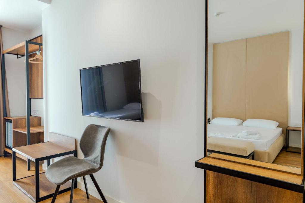 TV a/nebo společenská místnost v ubytování Hotel Central