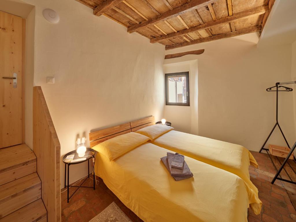 Postel nebo postele na pokoji v ubytování Bed and Breakfast Chiarina