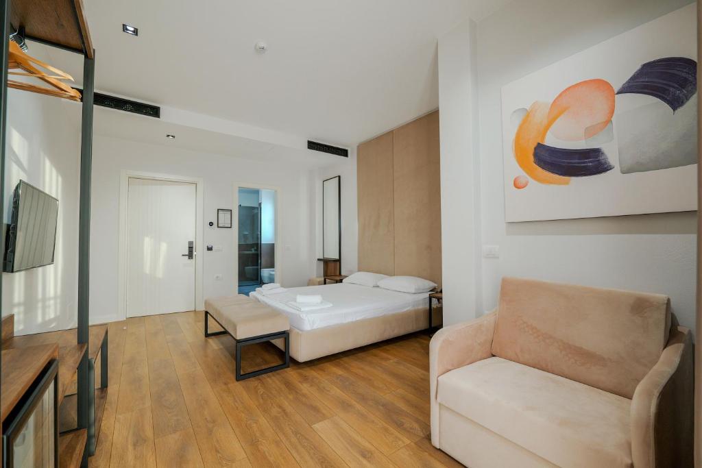 Postel nebo postele na pokoji v ubytování Hotel Central