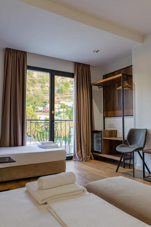 Postel nebo postele na pokoji v ubytování Hotel Central