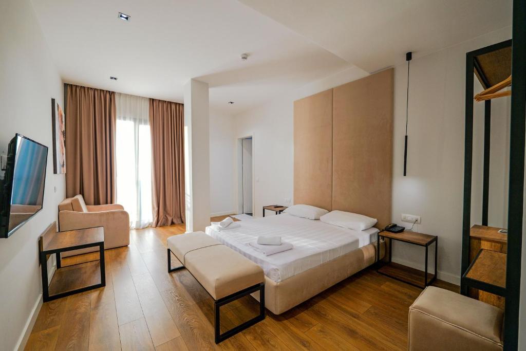 Postel nebo postele na pokoji v ubytování Hotel Central