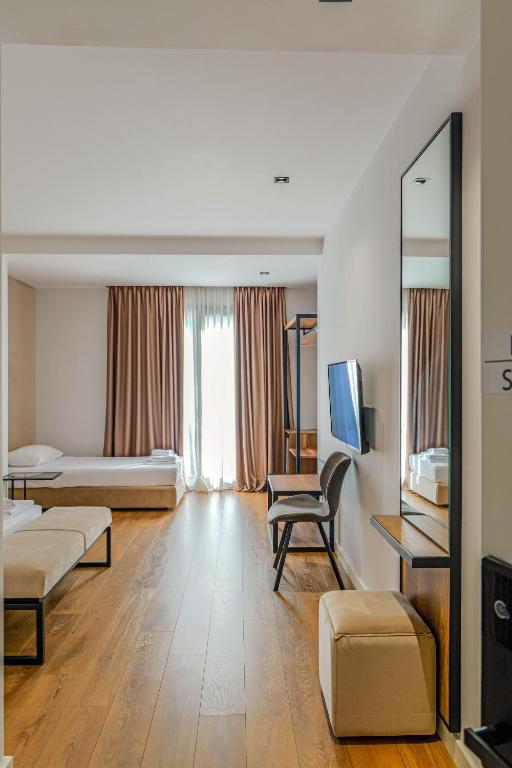 Postel nebo postele na pokoji v ubytování Hotel Central