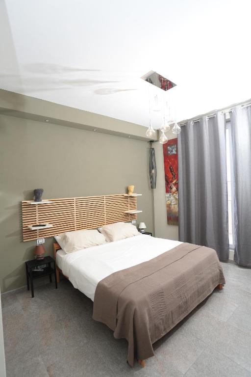 Postel nebo postele na pokoji v ubytování Oikia Atenea Automatic Rooms
