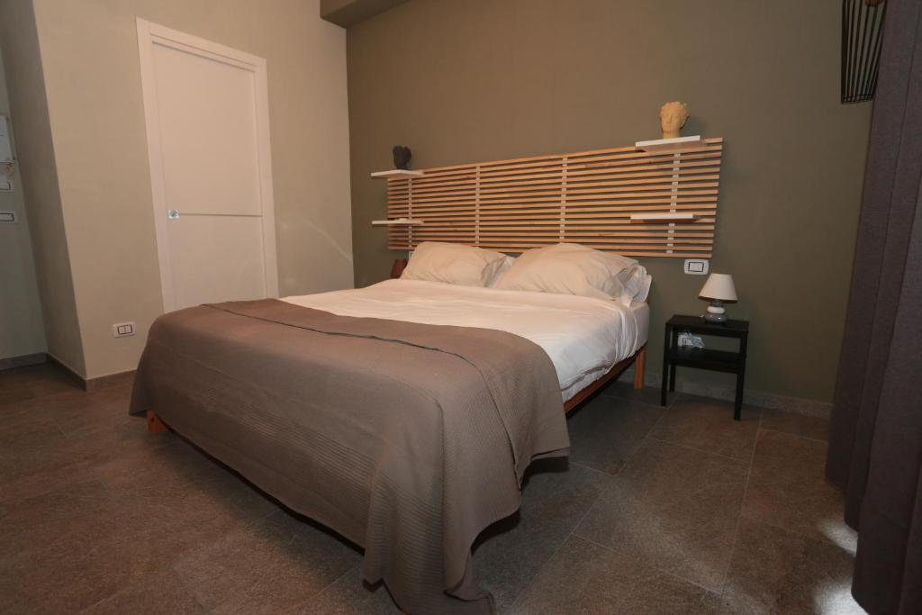 Postel nebo postele na pokoji v ubytování Oikia Atenea Automatic Rooms