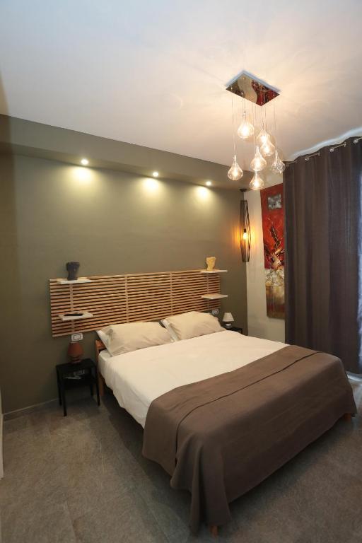 Postel nebo postele na pokoji v ubytování Oikia Atenea Automatic Rooms