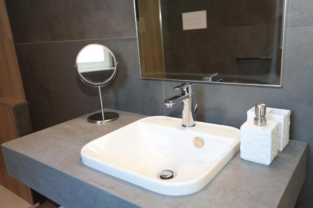 Koupelna v ubytování Oikia Atenea Automatic Rooms
