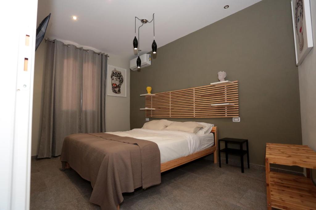 Postel nebo postele na pokoji v ubytování Oikia Atenea Automatic Rooms