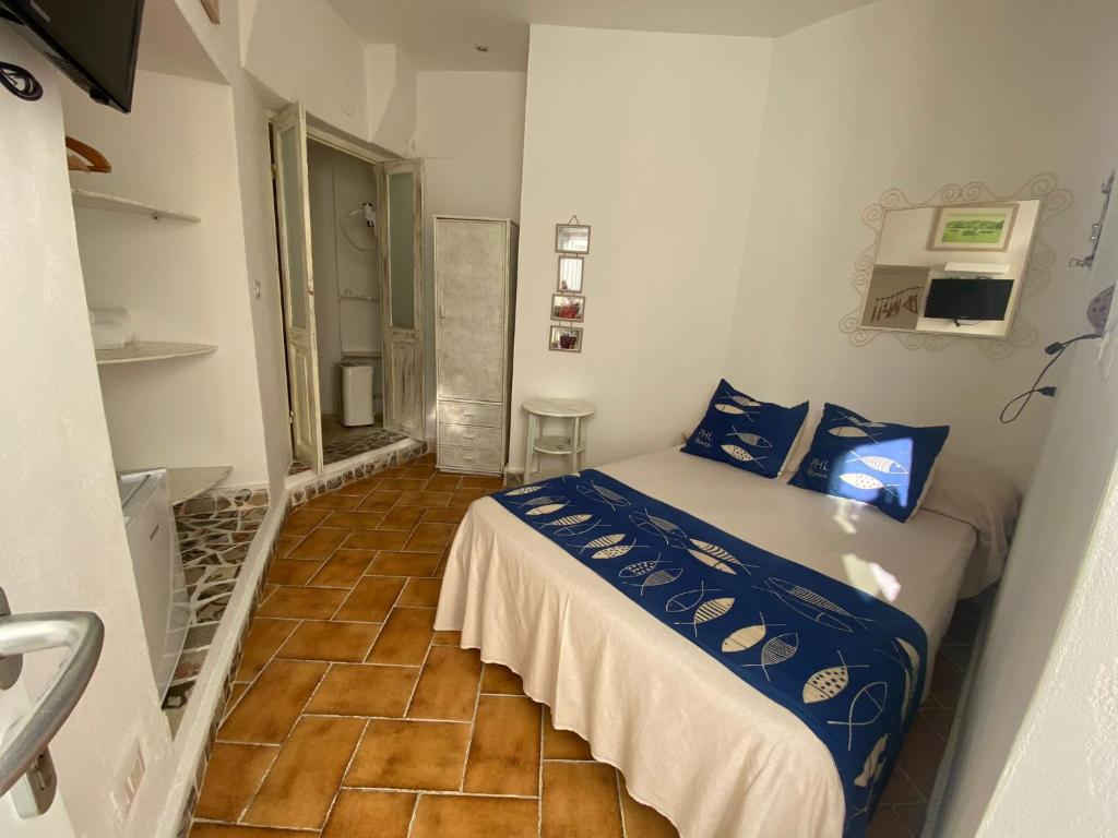 Postel nebo postele na pokoji v ubytování Piccolo Hotel Luisa