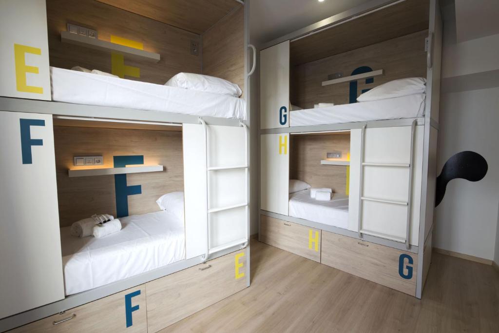 Posteľ alebo postele v izbe v ubytovaní U-Sense For You Hostel Sevilla