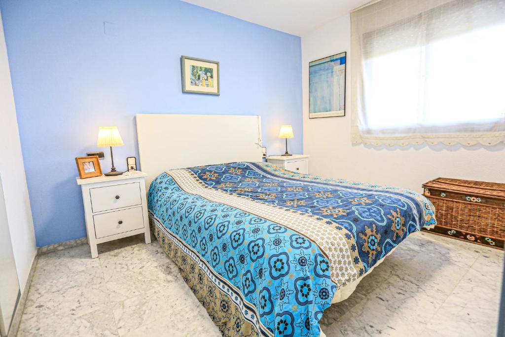 Postel nebo postele na pokoji v ubytování LITORAL COSTA DORADA - CANCUN Salou