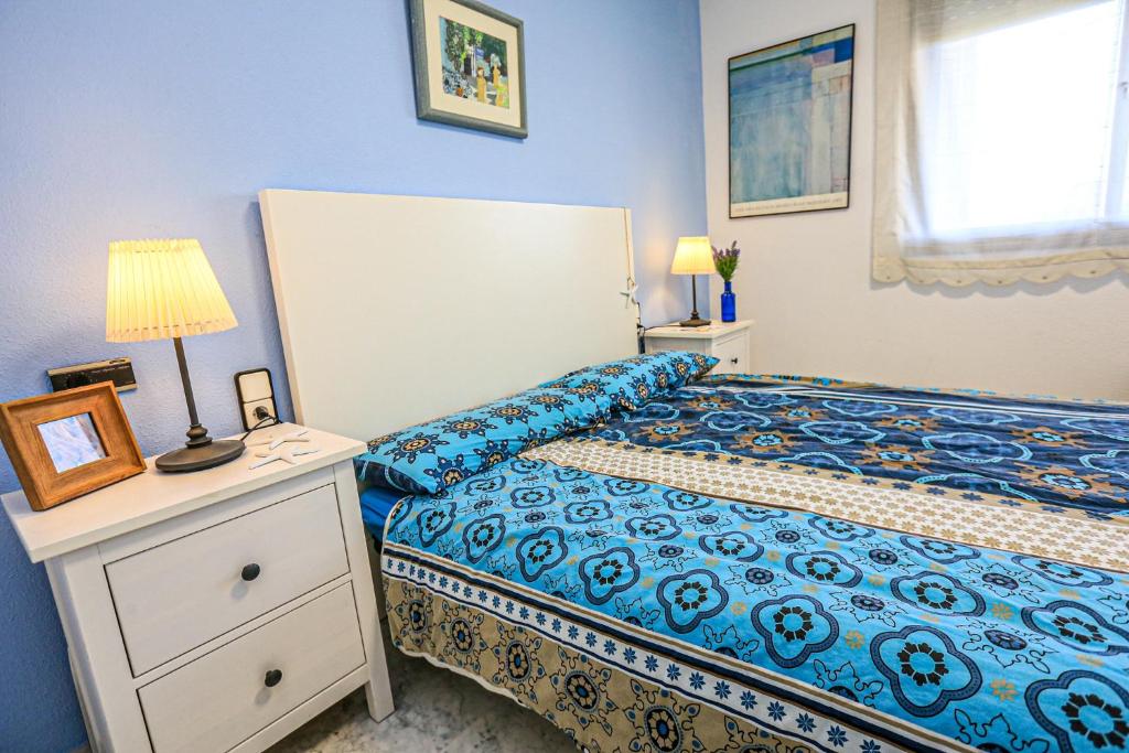 Postel nebo postele na pokoji v ubytování LITORAL COSTA DORADA - CANCUN Salou