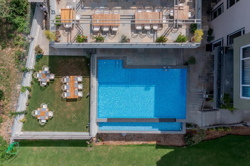 an overhead view of a swimming pool on a building at SURAMYA-A Luxury Boutique Hotel in Udaipur