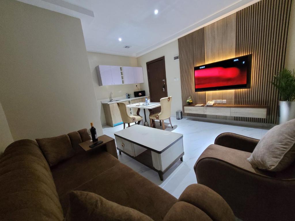 TV a/nebo společenská místnost v ubytování Carlton Swiss Grand Hotel