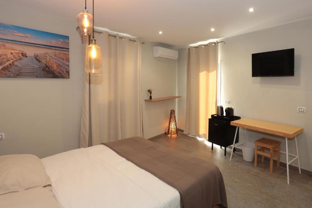 TV a/nebo společenská místnost v ubytování Oikia Atenea Automatic Rooms