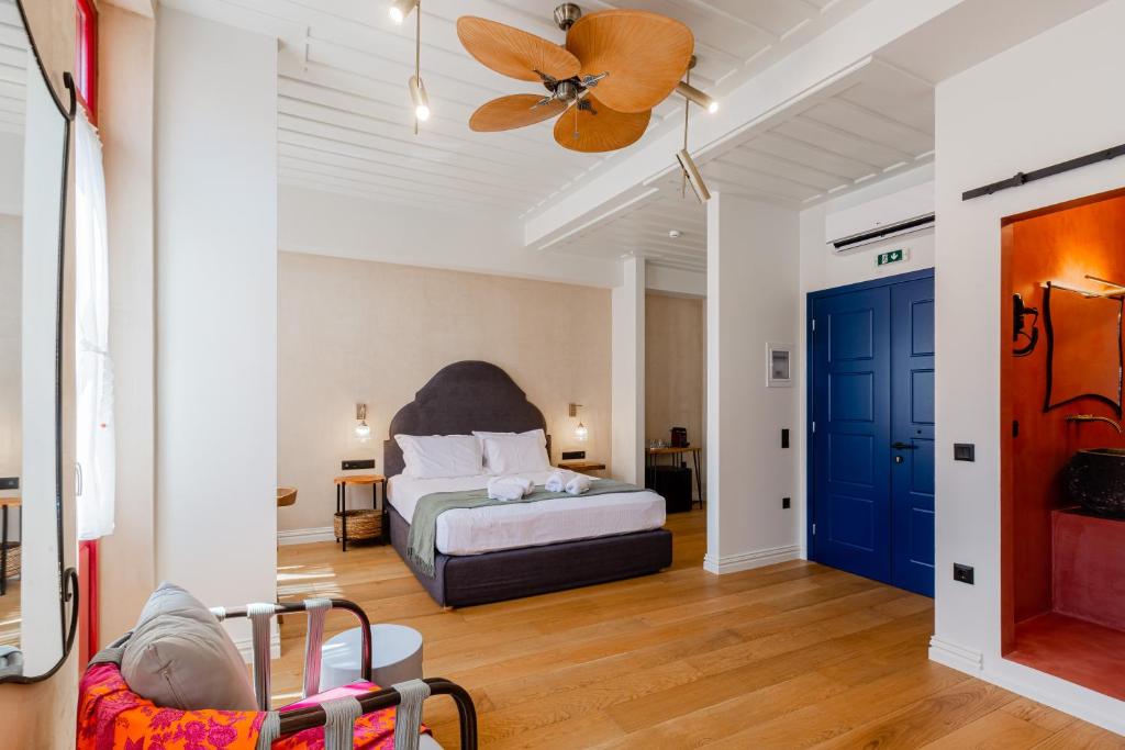 Postel nebo postele na pokoji v ubytování Danae Hotel