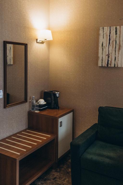 Kuchyň nebo kuchyňský kout v ubytování Costé Hotel