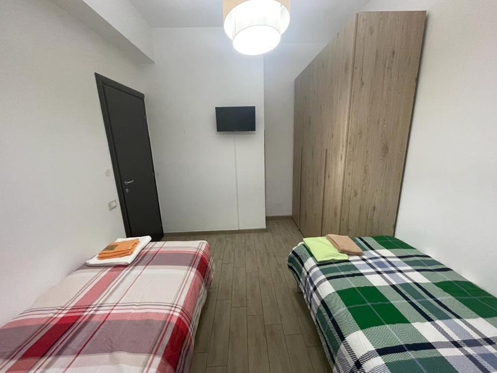 Una cama o camas en una habitación de appartamento fronte mare