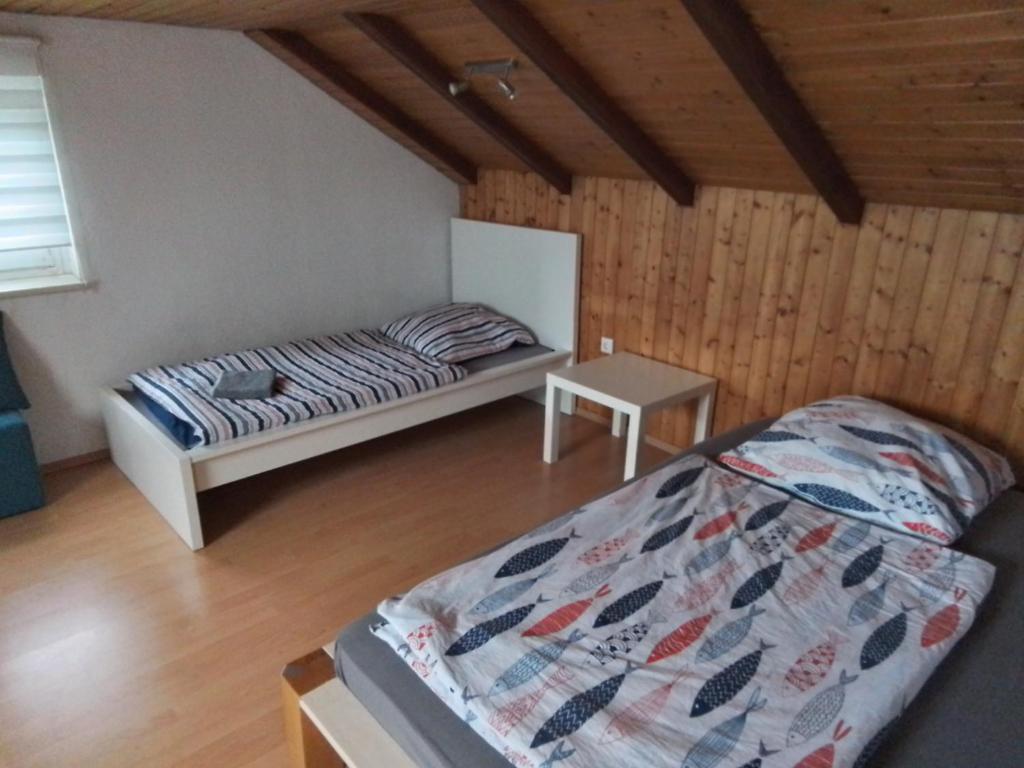 Llit o llits en una habitació de Ferienwohnung Franz