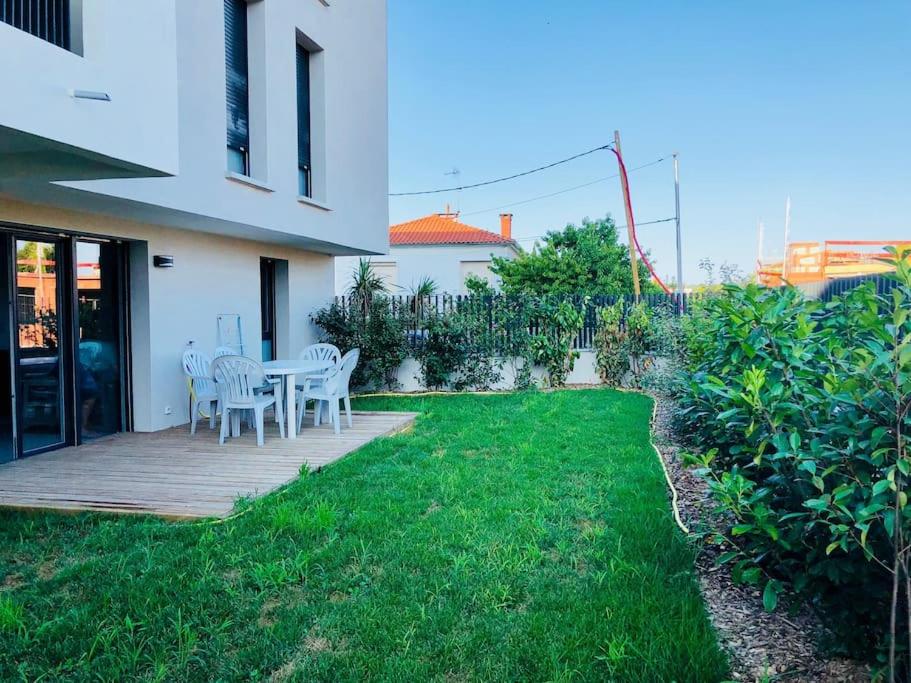 Κήπος έξω από το La Roseraie Toulousaine avec parking privé