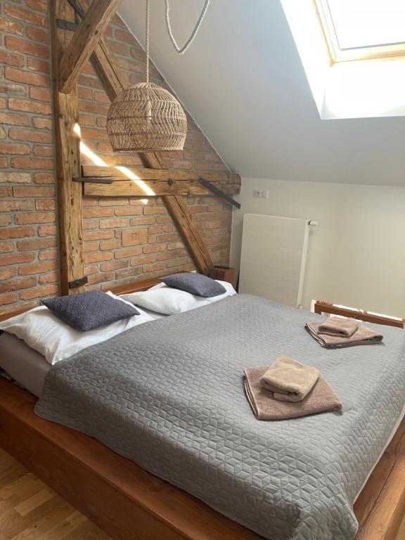 Postel nebo postele na pokoji v ubytování Apartmány Marienhof