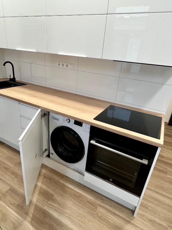 Kuchyň nebo kuchyňský kout v ubytování Sušilova 14 apartments III