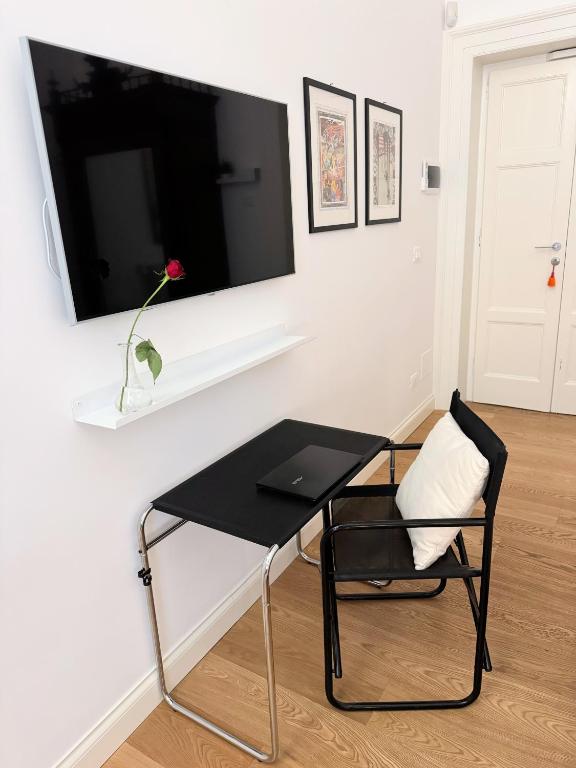 TV a/nebo společenská místnost v ubytování B&B 102