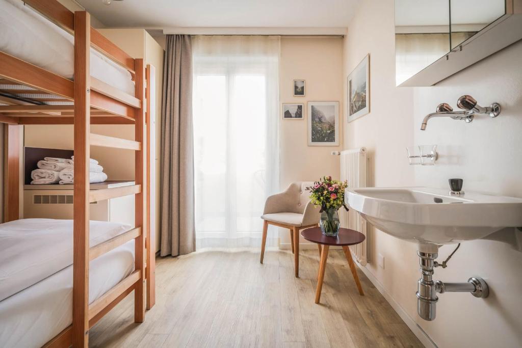 Postel nebo postele na pokoji v ubytování Wanderlust Guesthouse