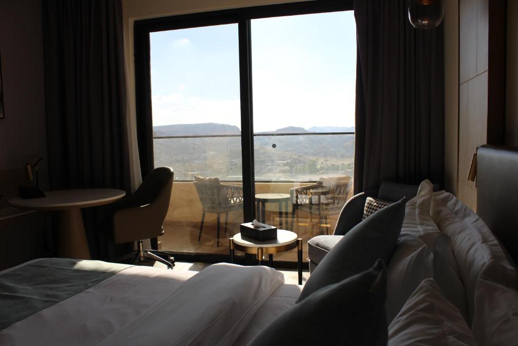 Posezení v ubytování H Luxury Hotel