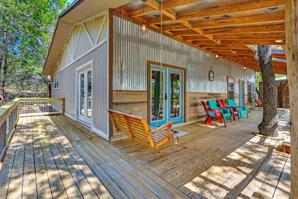 a porch of a house with a wooden deck at Bulverde Cottage at Moonlight Getaway in Bulverde