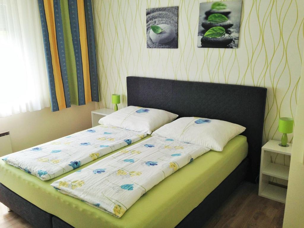 Postel nebo postele na pokoji v ubytování Nikolaushof